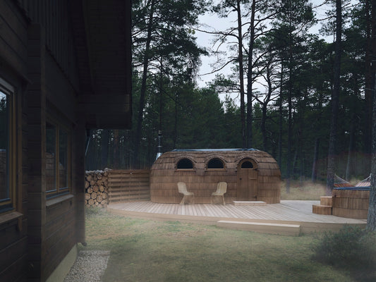 A house in the middle of a wooded area