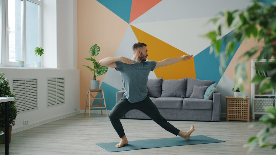 Man doing yoga on mat in colorful room