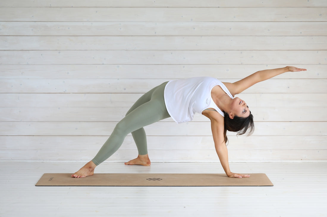 Woman in yoga pose on mat