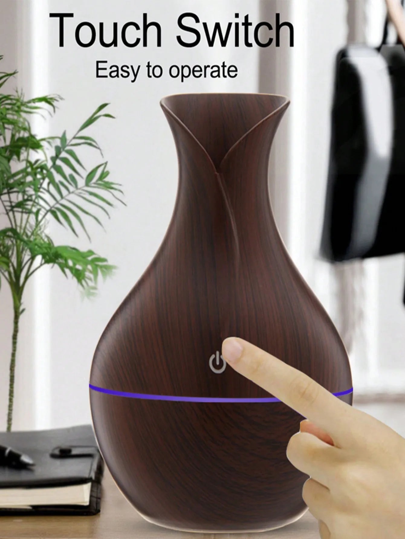 Wooden diffuser with touch switch on a blurred background
